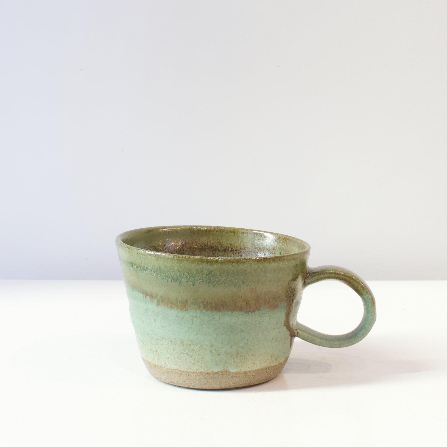 HP77: Green glazed mug
