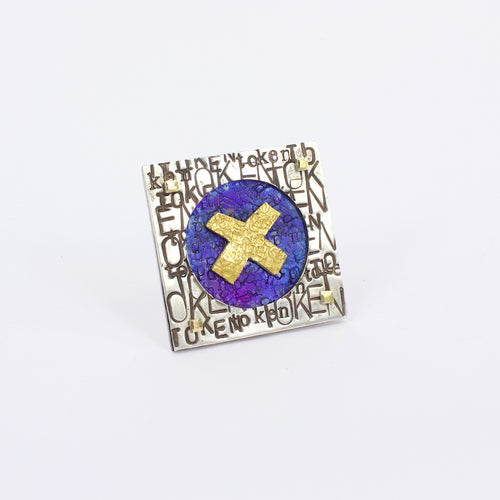 DM672A: Token politics brooch