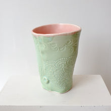 NML: Embossed beakers