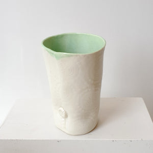 NML: Embossed beakers